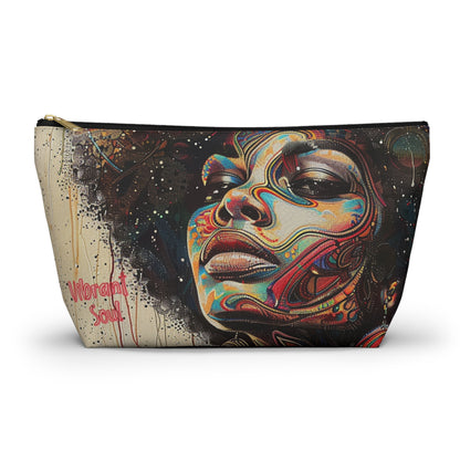 Vibrant Soul Afrocentric Accessory Pouch featuring a colorful tribal art design of a woman’s face with bold patterns, ideal for storing makeup, tech accessories, or everyday essentials.