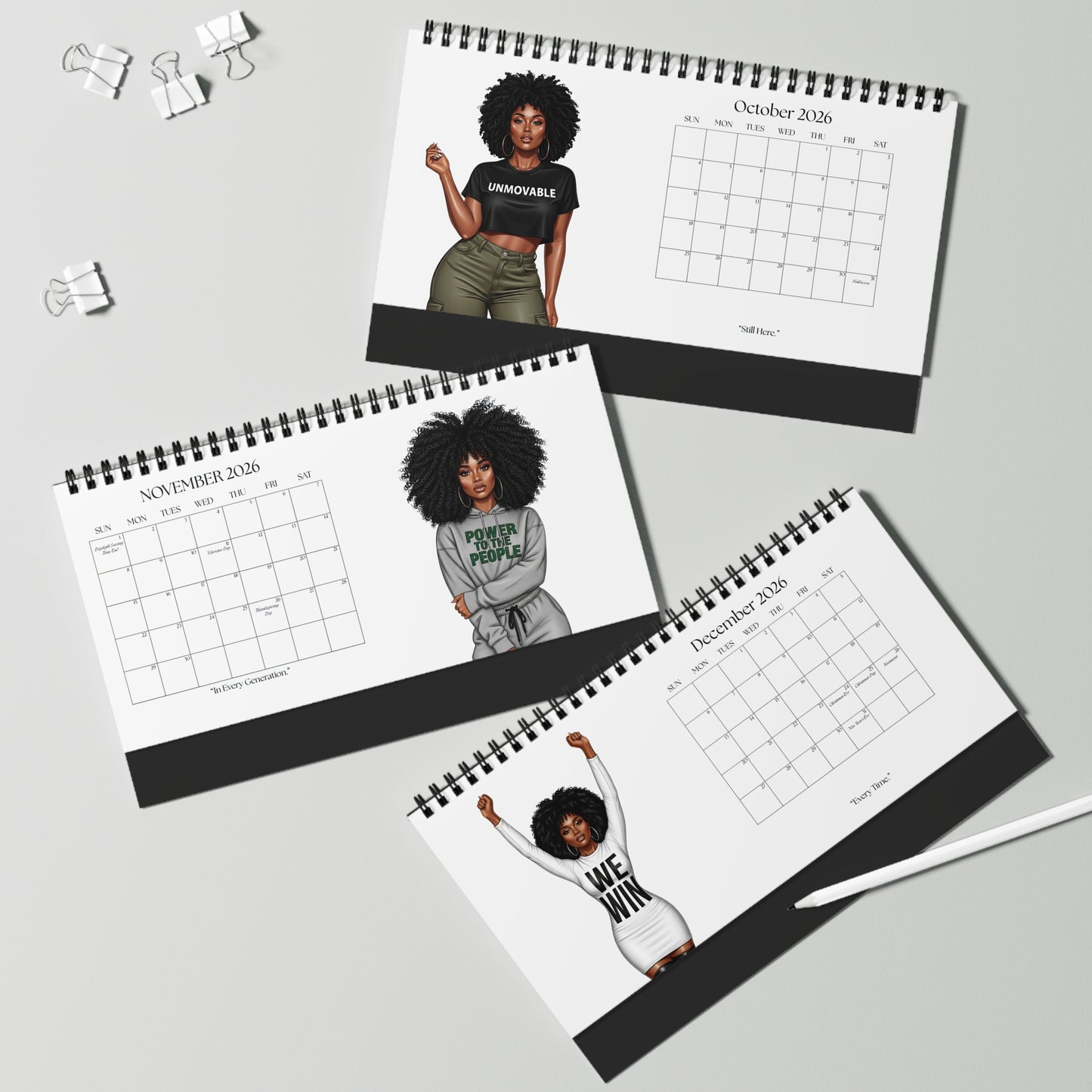 Three spiral-bound calendars featuring illustrations of a woman on a gray surface.