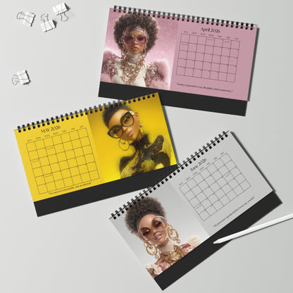 Black Girl Luxe 2026 desktop calendar  featuring 3 months of stylish Black women with natural hair, oversized glasses, and luxury fashion on pink, yellow, and grey color backgrounds.
