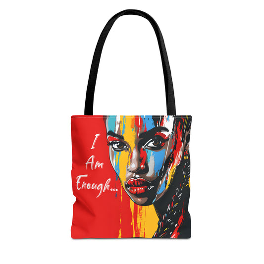 A striking tote bag showcasing a painted woman's face in bold colors with the empowering message "I Am Enough" on a vivid red background | EbMerized Creations